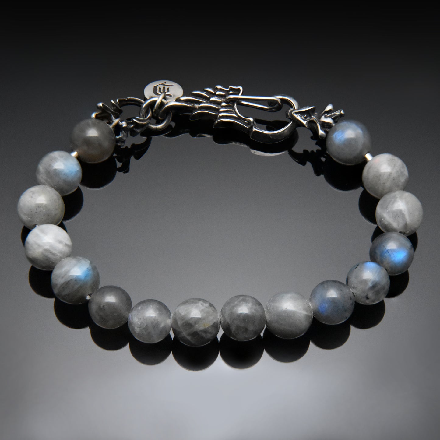 Bead bracelet with silver wing clasp