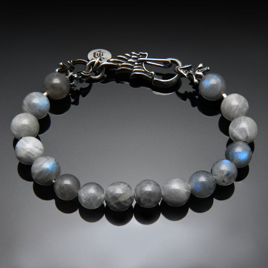 Bead bracelet with silver wing clasp