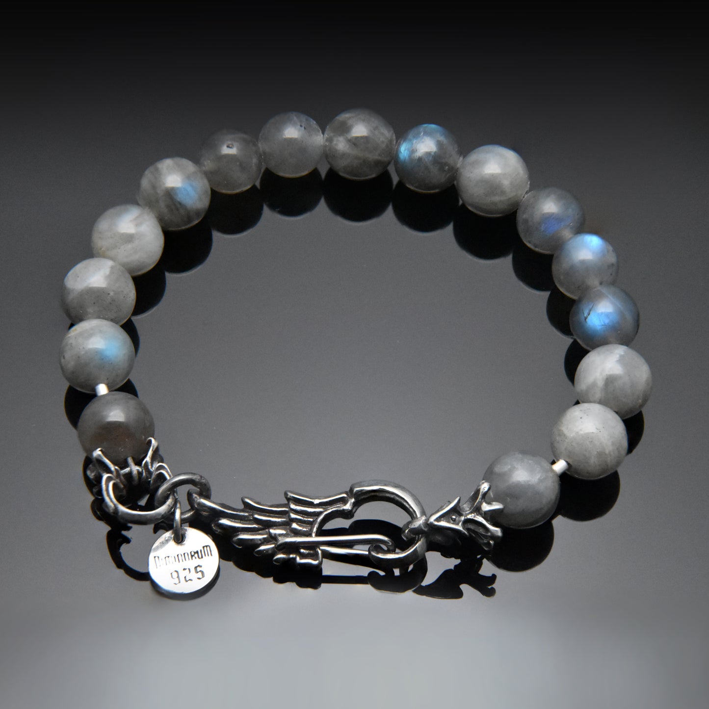 Bead bracelet with silver wing clasp